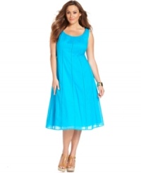 A slenderizing A-line shape elegantly defines J Jones New York's sleeveless plus size dress-- wear it from day to play! A slenderizing A-line shape elegantly defines J Jones New York's sleeveless plus size dress-- wear it from day to play!