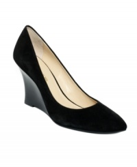 Stay on the path to success with this sleek shoe. Jones New York's Hudson pumps are made of suede and feature a stacked wedge heel. Stay on the path to success with this sleek shoe. Jones New York's Hudson pumps are made of suede and feature a stacked wedge heel.