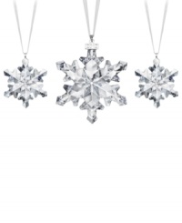 A flurry of sparkle and shine, the Swarovski crystal snowflake ornaments are the essence of holiday splendor. With a silvertone metal charm celebrating 2012 and white satin hanging ribbons. A flurry of sparkle and shine, the Swarovski crystal snowflake ornaments are the essence of holiday splendor. With a silvertone metal charm celebrating 2012 and white satin hanging ribbons.