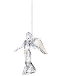 Inspire peace and tranquility with an awe-inspiring angel ornament. Shining in clear Swarovski crystal with iridescent wings and a golden star, it's a beautiful addition to the table or tree. Skirt engraved with 2012. Inspire peace and tranquility with an awe-inspiring angel ornament. Shining in clear Swarovski crystal with iridescent wings and a golden star, it's a beautiful addition to the table or tree. Skirt engraved with 2012.