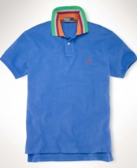 A classic short-sleeved polo shirt is cut for a trim, modern fit in smooth, soft cotton interlock. A classic short-sleeved polo shirt is cut for a trim, modern fit in smooth, soft cotton interlock.