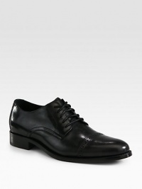 A handsome cap toe oxford crafted with artisan detail and constructed with concealed Nike Air Technology to maximize comfort.Leather upperLeather liningPadded insoleLeather/rubber soleImported A handsome cap toe oxford crafted with artisan detail and constructed with concealed Nike Air Technology to maximize comfort.Leather upperLeather liningPadded insoleLeather/rubber soleImported