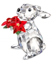 A bunny with a bouquet, this adorable figurine sparkles in faceted Swarovski crystal. Red poinsettias play up the Christmas cheer in a collectible that charms year-round. A bunny with a bouquet, this adorable figurine sparkles in faceted Swarovski crystal. Red poinsettias play up the Christmas cheer in a collectible that charms year-round.