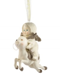On Dasher! A precious Snowbaby goes for a ride in this ornament from Department 56, crafted of pure porcelain bisque. Fine details of sparkling gold enhance its beauty, sure to bring joy to any tree. On Dasher! A precious Snowbaby goes for a ride in this ornament from Department 56, crafted of pure porcelain bisque. Fine details of sparkling gold enhance its beauty, sure to bring joy to any tree.