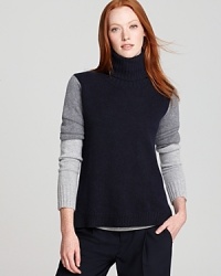 Perfectly on trend for fall, this bold color block Vince sweater is the perfect addition to your fall wardrobe--it's also exceptionally soft. Perfectly on trend for fall, this bold color block Vince sweater is the perfect addition to your fall wardrobe--it's also exceptionally soft.