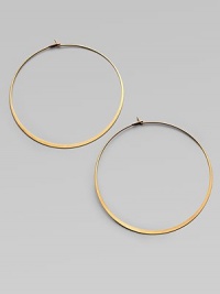 Make a quiet statement in these elegant hoop earrings. Goldtone metalLength, about 2.25Post closureImported Make a quiet statement in these elegant hoop earrings. Goldtone metalLength, about 2.25Post closureImported