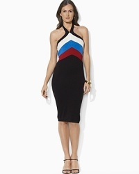 An ultra-soft knit dress is finished with a sultry halter neckline that adds feminine allure. An ultra-soft knit dress is finished with a sultry halter neckline that adds feminine allure.