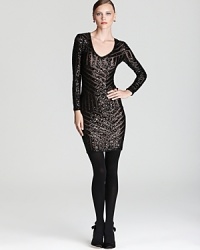 Go glam in this figure-flaunting BCBGMAXAZRIA dress, lavished with shimmering sequins in a classic chevron pattern. Go glam in this figure-flaunting BCBGMAXAZRIA dress, lavished with shimmering sequins in a classic chevron pattern.