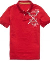 American Rag brings the collegiate cool to your wardrobe with their remix on a classic polo shirt. American Rag brings the collegiate cool to your wardrobe with their remix on a classic polo shirt.