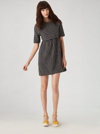 Woven with a darling polka-dot pattern, this cotton-blend boatneck has elbow length sleeves and a flared skirt.BoatneckButton closure at neckThree-quarter sleevesSlash pocketsAbout 19 from natural waist52% linen/48% cottonHand washImportedModel shown is 5'10 (177cm) wearing US size Small. Woven with a darling polka-dot pattern, this cotton-blend boatneck has elbow length sleeves and a flared skirt.BoatneckButton closure at neckThree-quarter sleevesSlash pocketsAbout 19 from natural waist52% linen/48% cottonHand washImportedModel shown is 5'10 (177cm) wearing US size Small.
