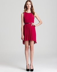 Embrace your inner lady in red in this detail oriented Sachin + Babi dress. The high/low hem is an instant update to the simple silhouette and the detachable leather belt allows you to accessorize as you wish. Embrace your inner lady in red in this detail oriented Sachin + Babi dress. The high/low hem is an instant update to the simple silhouette and the detachable leather belt allows you to accessorize as you wish.