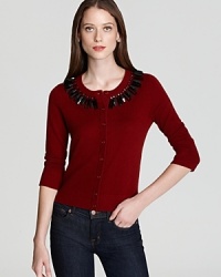 Stunning beaded embellishment shines from a classically styled kate spade new york cardigan for effortless elegance. Stunning beaded embellishment shines from a classically styled kate spade new york cardigan for effortless elegance.