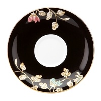 Painted Camellia brings vintage florals to life with just the right amount of color to make the dinner table unique. Draped against a gold-rimmed white canvas, delicate painted florals create a beautiful melodic feel. The salad plate, defined by a rich black background, is artfully juxtaposed to its white-bodied counterpart for a dramatic contrast. Painted Camellia brings vintage florals to life with just the right amount of color to make the dinner table unique. Draped against a gold-rimmed white canvas, delicate painted florals create a beautiful melodic feel. The salad plate, defined by a rich black background, is artfully juxtaposed to its white-bodied counterpart for a dramatic contrast.
