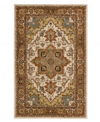 An elegant pattern, this Nourison rug features a design that melds classic Persian motifs with chic, natural color. With its opulent 100% natural wool construction, this yarn-dyed and meticulously hand-tufted rug offers a beautiful accent to traditional home décor. (Clearance)