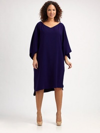 There's no need to sacrifice style for comfort when you wear this pull-on dress with a relaxed fit and feminine silhouette.V-neckFlutter sleevesPull-on styleFully linedAbout 25 from natural waistPolyesterDry cleanImported There's no need to sacrifice style for comfort when you wear this pull-on dress with a relaxed fit and feminine silhouette.V-neckFlutter sleevesPull-on styleFully linedAbout 25 from natural waistPolyesterDry cleanImported