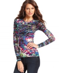 A bright painterly print adds a bold splash of color to this BCBGMAXAZRIA top -- perfect for adding a pop of pattern to your cold-weather look!