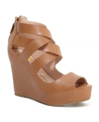 Reach for the sky with the Jude wedges from DV by Dolce Vita! These elevated sandals are a classy sidekick for shorts with their sleek leather upper and interweaving straps. Reach for the sky with the Jude wedges from DV by Dolce Vita! These elevated sandals are a classy sidekick for shorts with their sleek leather upper and interweaving straps.