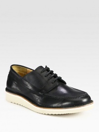 Lace-up style of rich leather with contrasting vibram sole.Leather upperLeather liningPadded insoleVibram soleImported Lace-up style of rich leather with contrasting vibram sole.Leather upperLeather liningPadded insoleVibram soleImported