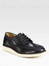 Lace-up style of rich leather with contrasting vibram sole.Leather upperLeather liningPadded insoleVibram soleImported