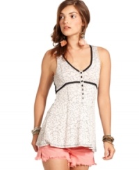 A floral print and lace trim makes this Free People tank a flirty pick for summer style! A floral print and lace trim makes this Free People tank a flirty pick for summer style!