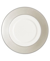 Set a dazzling tea or coffee service with this fine china saucer. From innovative designer Monique Lhullier, it features a pearlescent border with glossy raised dots and a fine stitch-like pattern. Set a dazzling tea or coffee service with this fine china saucer. From innovative designer Monique Lhullier, it features a pearlescent border with glossy raised dots and a fine stitch-like pattern.