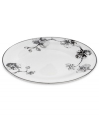Compose a striking arrangement with the Black Orchid dinner plate by Michael Aram. Fine white Limoges porcelain flourishes under a dark watercolor motif inspired by foliage from around the world. Compose a striking arrangement with the Black Orchid dinner plate by Michael Aram. Fine white Limoges porcelain flourishes under a dark watercolor motif inspired by foliage from around the world.