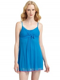 THE LOOKCrossover v-neck with underlayAdjustable strapsEmpire waist with bow accentGathered detailsContrast lace-trimmed hemTHE FITAbout 30 from shoulder to hemTHE MATERIALNylonCARE & ORIGINMachine washImported THE LOOKCrossover v-neck with underlayAdjustable strapsEmpire waist with bow accentGathered detailsContrast lace-trimmed hemTHE FITAbout 30 from shoulder to hemTHE MATERIALNylonCARE & ORIGINMachine washImported