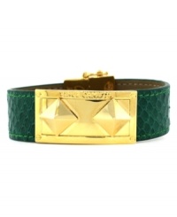 Style meant to make a fierce statement. Vince Camuto's chic snap bracelet combines snake-embossed green leather and a gold tone mixed metal pyramid-stud plate and closure. Approximate length: 8 inches. Style meant to make a fierce statement. Vince Camuto's chic snap bracelet combines snake-embossed green leather and a gold tone mixed metal pyramid-stud plate and closure. Approximate length: 8 inches.