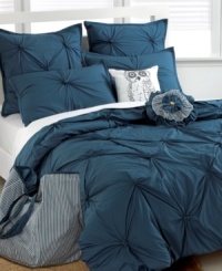 Lost at sea. Indulge in the deep blue of this Tufted Squares comforter set, featuring tufted fabric and button details for added texture and style. Two distinctive decorative pillows accessorize the set giving an artistic touch to your bed. Lost at sea. Indulge in the deep blue of this Tufted Squares comforter set, featuring tufted fabric and button details for added texture and style. Two distinctive decorative pillows accessorize the set giving an artistic touch to your bed.