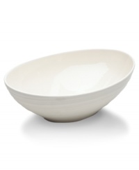 With the natural appeal of hand-thrown pottery, the Swirl White vegetable bowl achieves unfussy elegance in classic stoneware. Coordinates with Mikasa white dinnerware. The dishes have a smooth, glossy surface that contrasts the matte ribbed exterior for dynamic casual tables. With the natural appeal of hand-thrown pottery, the Swirl White vegetable bowl achieves unfussy elegance in classic stoneware. Coordinates with Mikasa white dinnerware. The dishes have a smooth, glossy surface that contrasts the matte ribbed exterior for dynamic casual tables.