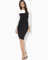 Bold color-blocking lends a modern edge to a sleek dress crafted in matte jersey for easy elegance. Bold color-blocking lends a modern edge to a sleek dress crafted in matte jersey for easy elegance.