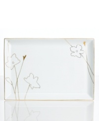 Wildflowers take off on glazed white porcelain, glowing as they tumble aimlessly around this Charter Club platter. A banded edge adds a classic touch to a pattern with modern spirit. Wildflowers take off on glazed white porcelain, glowing as they tumble aimlessly around this Charter Club platter. A banded edge adds a classic touch to a pattern with modern spirit.