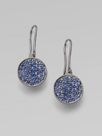 Discs of 14k white gold boast rich clusters of sparkling, vibrant blue sapphires.Sapphire 14k white gold Diameter, about ½ Ear wire Made in USA