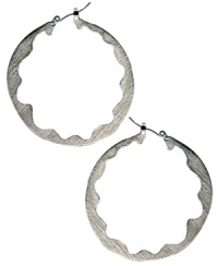 It's all about intricate touches and subtle textures. FALCHI by Falchi's exotic hoop earrings features a scalloped design in silver tone mixed metal. Approximate diameter: 1-5/8 inches. It's all about intricate touches and subtle textures. FALCHI by Falchi's exotic hoop earrings features a scalloped design in silver tone mixed metal. Approximate diameter: 1-5/8 inches.