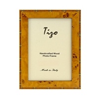 Exquisitely detailed with inlaid marquetry and a high gloss finish, these Italian wood frames offer a perfect way to showcase your pictures. Available in three sizes. Exquisitely detailed with inlaid marquetry and a high gloss finish, these Italian wood frames offer a perfect way to showcase your pictures. Available in three sizes.
