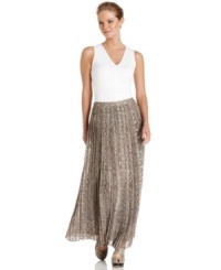 A snakeskin print and pleats create a chic effect on MICHAEL Michael Kors' petite maxi skirt. Pair this on-trend piece with a basic top to maximize your look! A snakeskin print and pleats create a chic effect on MICHAEL Michael Kors' petite maxi skirt. Pair this on-trend piece with a basic top to maximize your look!