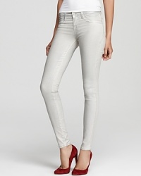 Metallic-coated J Brand skinny jeans strut into the new season with trendsetting shine in a casual low-rise silhouette. Metallic-coated J Brand skinny jeans strut into the new season with trendsetting shine in a casual low-rise silhouette.