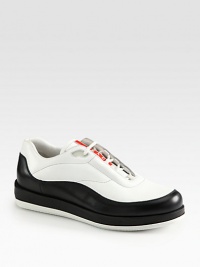 Sleek, sophisticated leather with signature logo detail.Leather upperLeather liningPadded insoleRubber soleMade in Italy