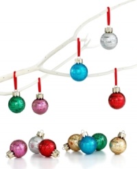 All that glitters. Sparkling rings wrap around each mini jewel-tone bulb for a look that makes the season even brighter. All that glitters. Sparkling rings wrap around each mini jewel-tone bulb for a look that makes the season even brighter.