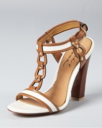 A looping ladder extends down the front of the Rosey sandals, crafted in a summery mix of canvas and leather. From Mark+James by Badgley Mischka. A looping ladder extends down the front of the Rosey sandals, crafted in a summery mix of canvas and leather. From Mark+James by Badgley Mischka.