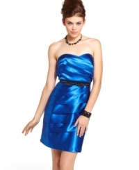 A network of pleats create cool, asymmetrical design on a party dress from BCX enhanced all the more by a studded bow belt! A network of pleats create cool, asymmetrical design on a party dress from BCX enhanced all the more by a studded bow belt!