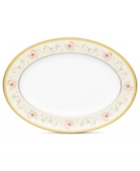 East meets West in the ornate Blooming Splendor oval platter by Noritake. A Japanese-inspired pattern with raised dots encircles intricate florals rooted in white bone china. East meets West in the ornate Blooming Splendor oval platter by Noritake. A Japanese-inspired pattern with raised dots encircles intricate florals rooted in white bone china.