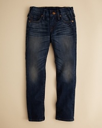 A beautifully damaged jean from True Religion, replete with heavy fading, dirty dyes and bleached-out wrinkles. A beautifully damaged jean from True Religion, replete with heavy fading, dirty dyes and bleached-out wrinkles.