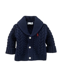 A soft cabled cotton cardigan is knit with a shawl collar and signature details for a heritage look. A soft cabled cotton cardigan is knit with a shawl collar and signature details for a heritage look.