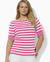 Crafted with a sleek boat neck and elbow-length sleeves, the Benny is essential both for layering and wear-alone style. Crafted with a sleek boat neck and elbow-length sleeves, the Benny is essential both for layering and wear-alone style.