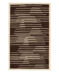 Light and dark tones of brown and beige collide to produce this dynamic piece, designed by Surya's world-renowned artisans. Transforming any decor from static to stirring, the Studio Rowe area rug uses hand-tufted New Zealand wool to create an ultra-soft surface that lasts in the most high-traffic environments. Light and dark tones of brown and beige collide to produce this dynamic piece, designed by Surya's world-renowned artisans. Transforming any decor from static to stirring, the Studio Rowe area rug uses hand-tufted New Zealand wool to create an ultra-soft surface that lasts in the most high-traffic environments.
