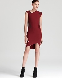 Cut to hug your figure, this sleek Helmut Lang dress touts contrast leather insets, asymmetric styling and an exposed back zip for the definition of modern luxury. Cut to hug your figure, this sleek Helmut Lang dress touts contrast leather insets, asymmetric styling and an exposed back zip for the definition of modern luxury.