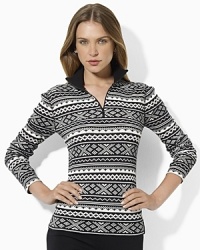 A soft waffle-knit cotton top is a festive choice for the season, crafted with an allover Fair Isle pattern and a zippered mockneck. A soft waffle-knit cotton top is a festive choice for the season, crafted with an allover Fair Isle pattern and a zippered mockneck.