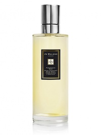 Scent the air with the ruby-rich juices of fruits, spiked with pink pepper and spicy woods. Enigmatic. 5.9 oz. Scent the air with the ruby-rich juices of fruits, spiked with pink pepper and spicy woods. Enigmatic. 5.9 oz.