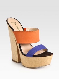 Modernize your wardrobe with this leather platform design, equipped with vibrant colorblocked straps and a wooden heel. Wooden heel, 6 (150mm)Wooden platform, 1½ (40mm)Compares to a 4½ heel (115mm)Leather upperLeather lining and solePadded insoleImported Modernize your wardrobe with this leather platform design, equipped with vibrant colorblocked straps and a wooden heel. Wooden heel, 6 (150mm)Wooden platform, 1½ (40mm)Compares to a 4½ heel (115mm)Leather upperLeather lining and solePadded insoleImported